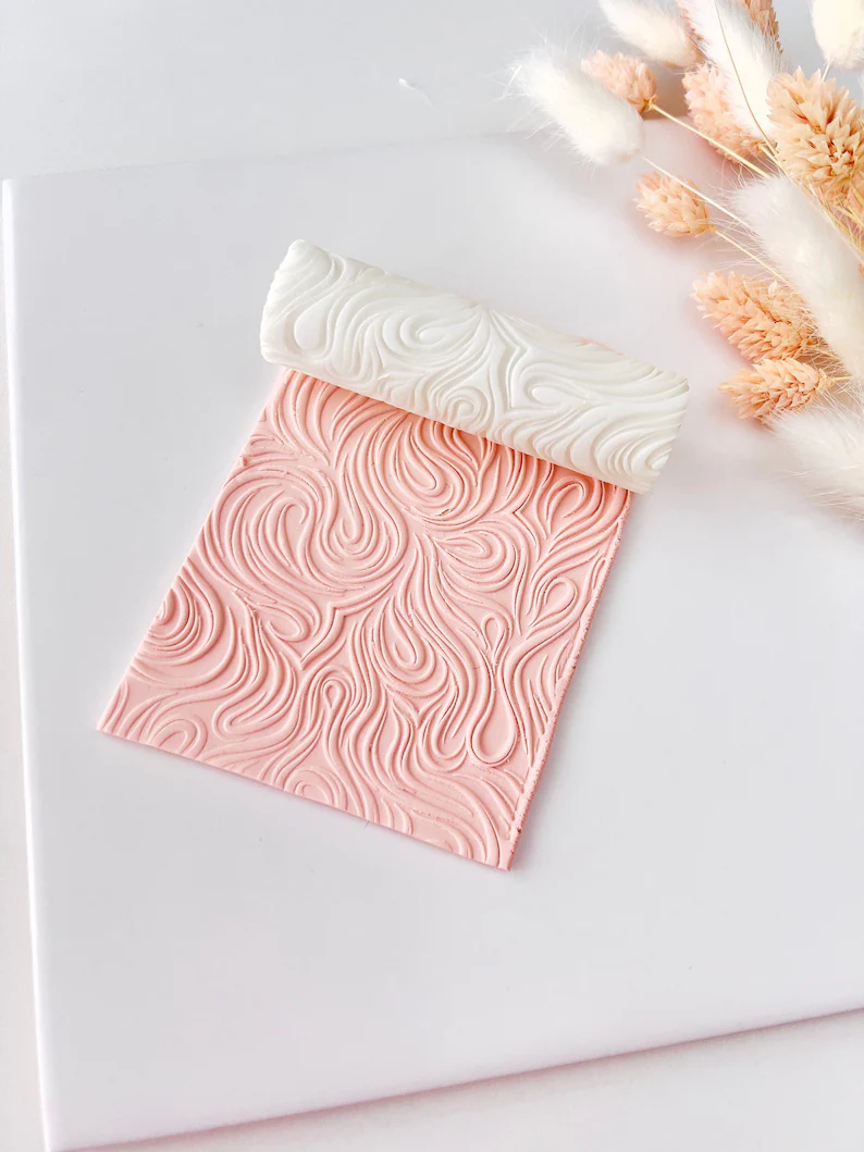 Rodillo de textura con patrón de ondas y remolinos